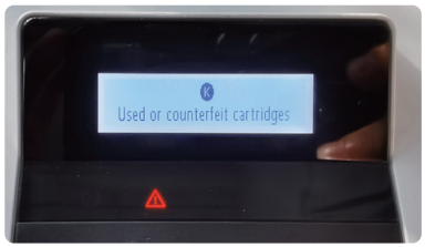 printer info display showing 'Used or Counterfeit cartridges' message