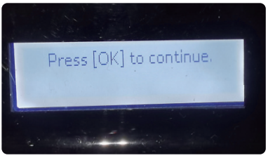 printer info display showing message 'Press Ok to continue'